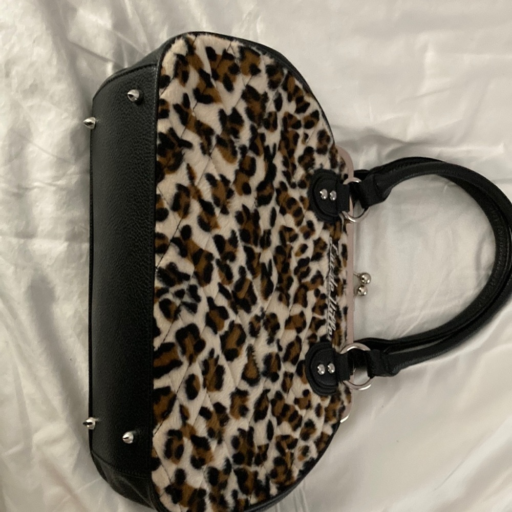 Lux de ville leopard print hand bag. Used once, too small for my needs.
